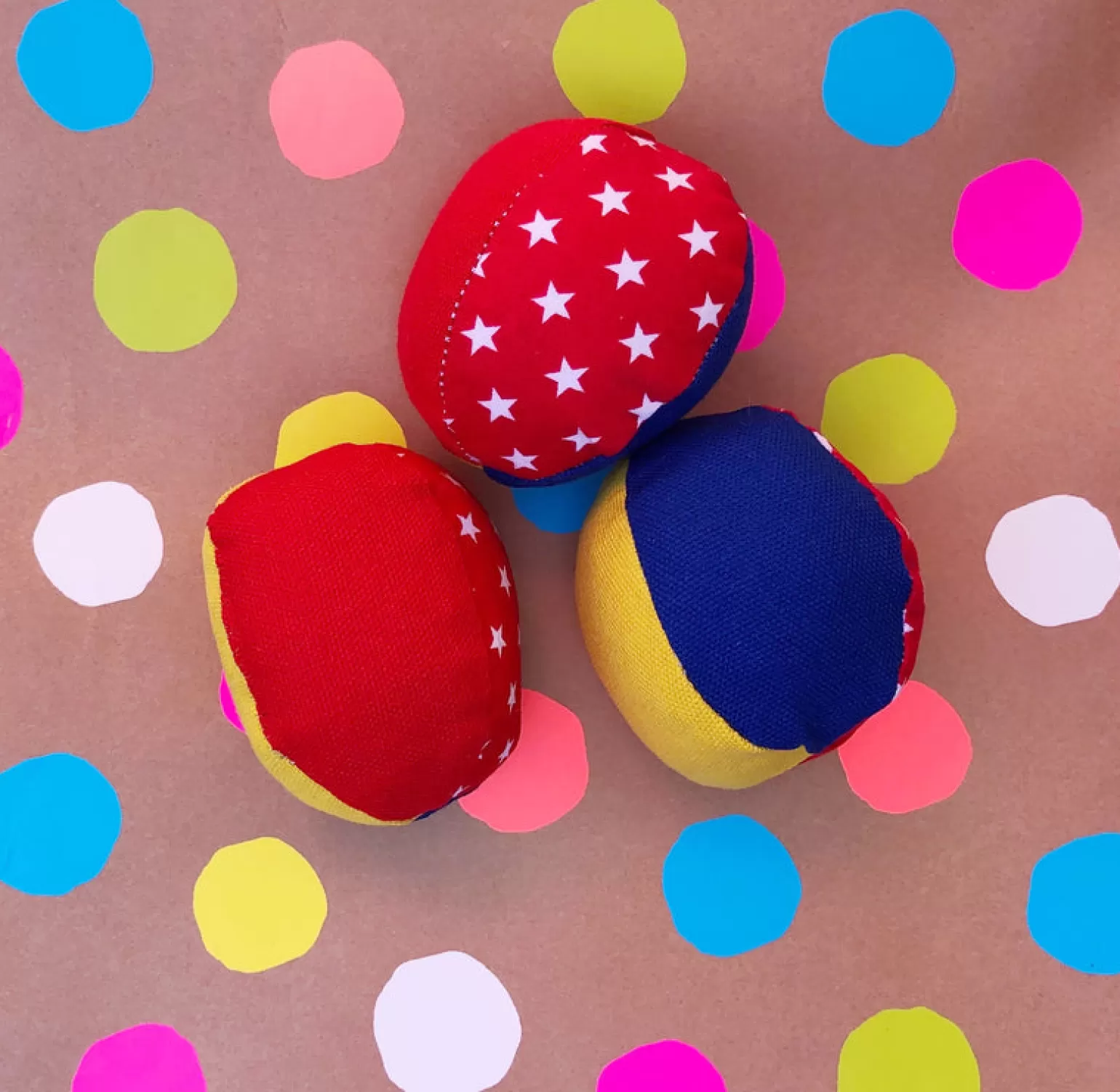 Harlequin Toys Juggling Balls - Blue Red And Yellow With Stars